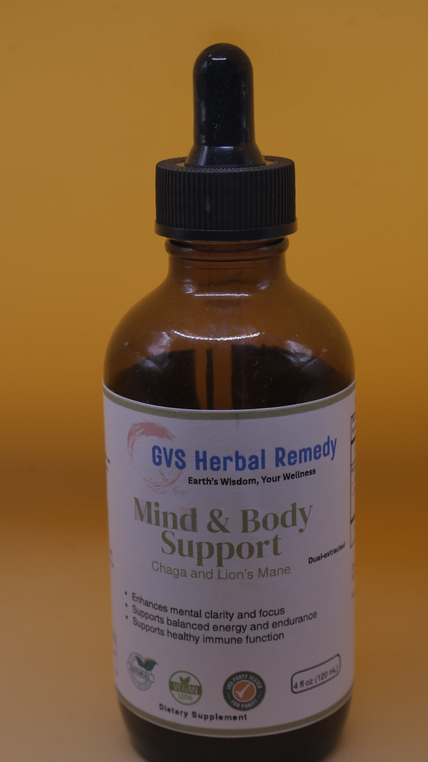 Bottle of 'Mind & Body Support' herbal remedy with a dropper 